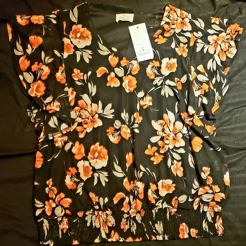 NWT. Black floral top.